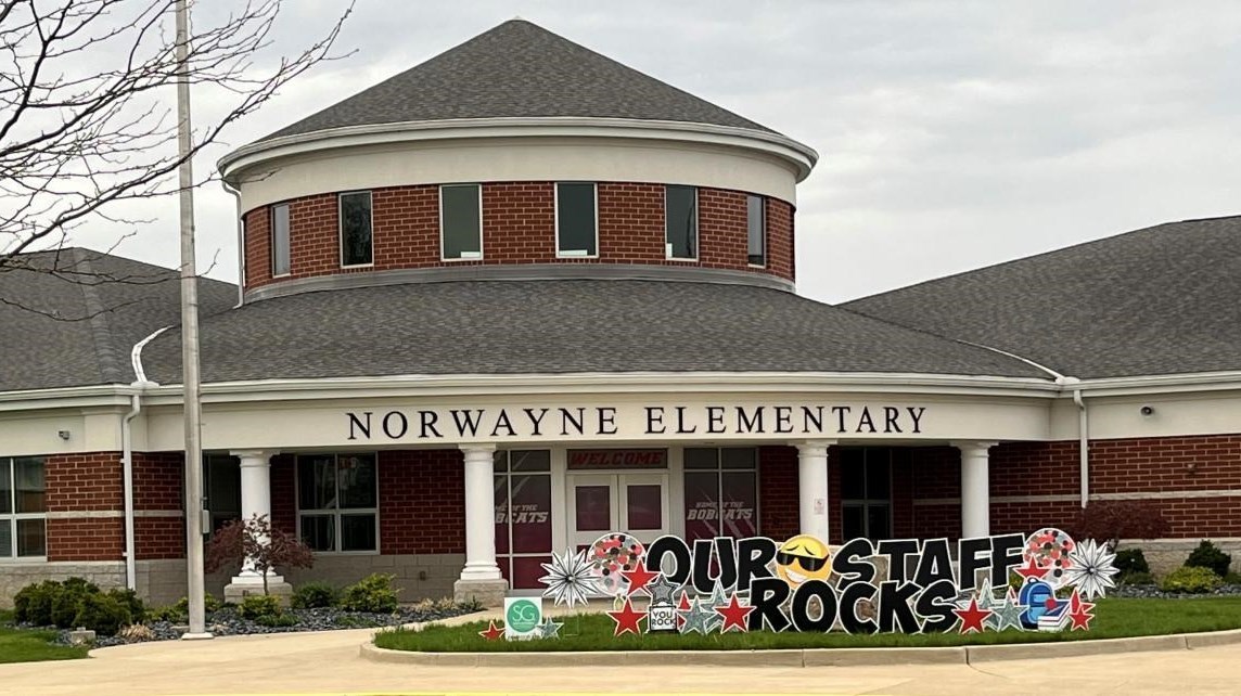 &#34;Our Staff Rocks&#34; sign in front of the Norwayne Elementary school building